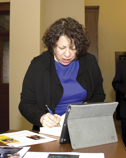 Justice Sotomayor signing her memoir 