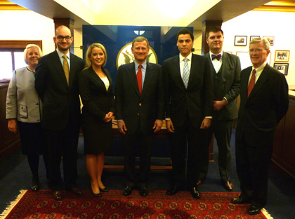 Chief Justice Roberts with Judge O’Scannlain and his chambers staff