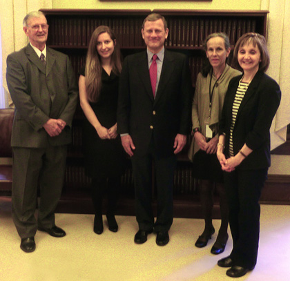 Chief Justice Roberts with Judge Leavy and his chambers staff 